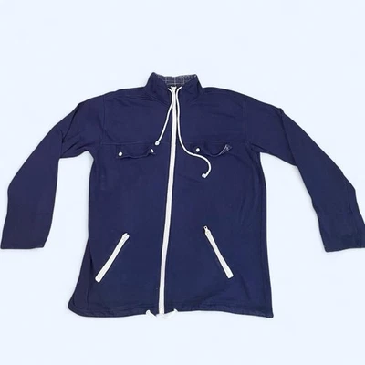 Sudadera con capucha azul marino con cremallera con detalles blancos, bolsillos con cremallera y hombreras TALLA M Foto 1 de 4