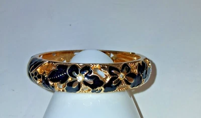 Brazalete Hawaiiam Esmaltado Floral Bisagras, Dorado y Negro Foto 1 de 3