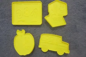Set of 4 yellow back to school cookie cutters with computer, bus, apple & ABC - Picture 1 of 7