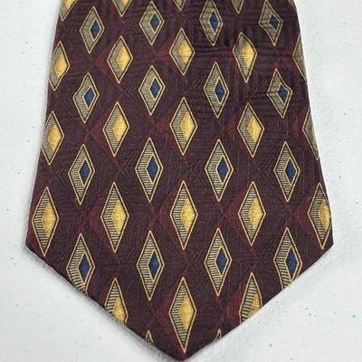 Corbata de seda Bill Bass etiqueta negra roja amarilla azul con estampado de diamantes hecha en México Foto 1 de 4