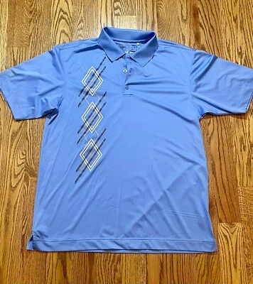 Camisa de golf Cutter & Buck Dry Tec Argyle azul amarillo blanco negro grande para hombre usada en excelente estado Foto 1 de 4