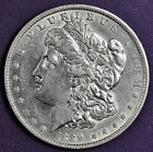 1889-O Morgan Silver Dollar.  Chest Feather's.  Au-Unc.  189719
