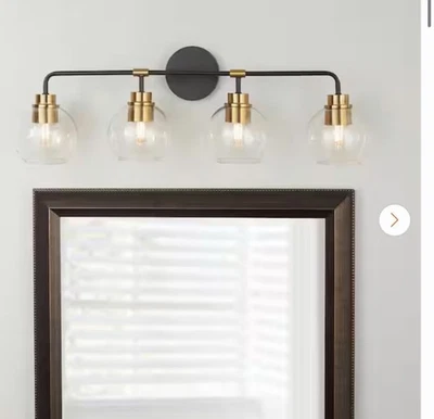 Home Decorators Collection Lawrence 4 Light Aged Bronze and Brass Vanity Light - Image 1 of 4