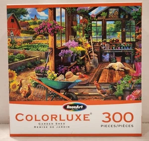 RoseArt Gartenhaus 300 Teile Puzzle Golden Retriever Welpe Huhn Blumen - Bild 1 von 6