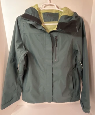 Chaqueta cortavientos Stoic para mujer pequeña pequeña verde oscuro anorak con capucha usada en excelente estado Foto 1 de 4
