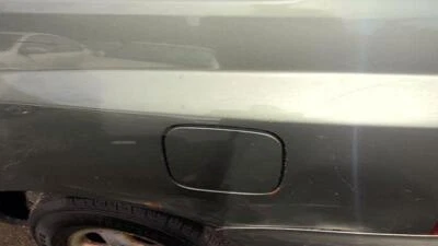 2004, 2005, 2006, 2007 - Toyota Highlander - Puerta del tanque de combustible OEM: 7735048070 Foto 1 de 4