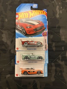 2024/25🔥Hot Wheels🔥’15 Mazda MX-5 Miata Trio, alle 3 verschieden, Maßstab 1:64 - Bild 1 von 4