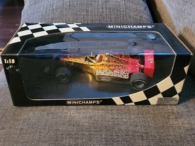Minichamps 1/18 US Grand Prix IMS Event Car 2000 Fórmula 1 Inaugural GP Gold  Foto 1 de 4