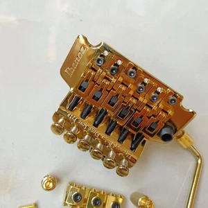 Sistema de doble bloqueo Bridge Floyd Tremolo Bridge para guitarra Ibanez dorada - Imagen 1 de 6