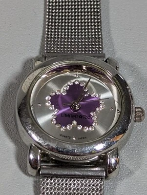 紫色星星表盘圆形银色表壳网眼不锈钢表带手表 — 第 1/4 张图片