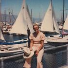 Vintage Polaroid Photo Cute Lady Holding Hat Sailboats Sky Found Art Snapshot