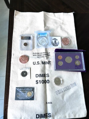 LOTE DE MONEDAS DIVERSAS Bolsa de Banco 1993 Prueba Como Nueva Conjunto Cobre Rondas Fantasía 1986 1/2 Dólar Foto 1 de 4