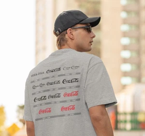 T-Shirt Nuova Coca-Cola Logo Evoluzione Qualità Premium S-2XL - Foto 1 di 2