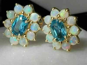 Aretes con halo de ópalo y topacio azul ovalados de 3 quilates enchapados en oro amarillo de 14 quilates - Imagen 1 de 4