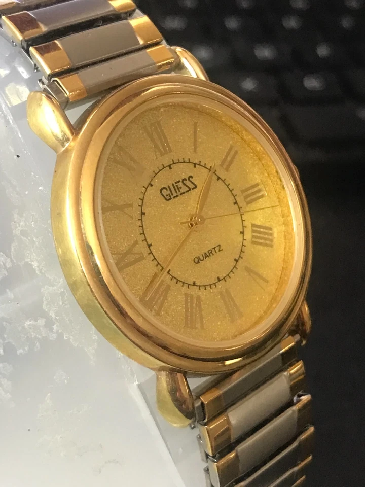 Reloj para hombre GUESS 35mm década de 1990 esfera dorada cuarzo chapado en oro, funciona (lote 2040) Foto 1 de 4