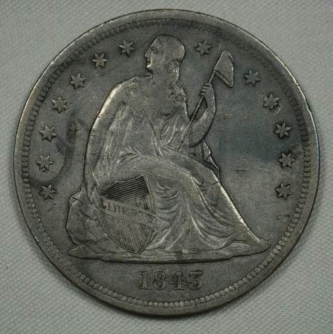 1843 $1 (35) Seated Liberty Dollar. Very Fine, Sharp Details, Discolored Cover