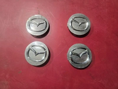 Tapacubos centrales para llantas Mazda NC76 37190 (4 piezas) OEM Miata Foto 1 de 4