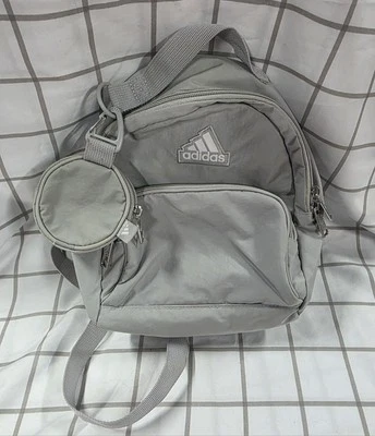 ADIDAS MINI BACKPACK IN OFF Light GREY WITH BAG CHARM. ONE SIZE - Image 1 of 4