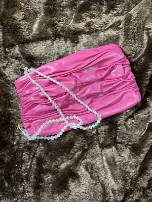 Bolso sin asas de cuero sintético rosa Elizabeth Arden Foto 1 de 4