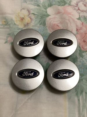 Tapacubos central de escape original Ford Taurus 2008-12 OEM # AL84 1A096 BA 4 piezas Foto 1 de 4