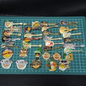 Juego de 33 prendedores de solapa de seguridad Hard Rock Café vintage raro lote antiguo Japón - Imagen 1 de 12