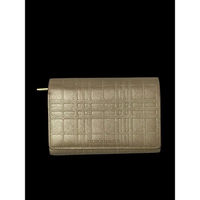 Cartera Burberry de cuero dorado en relieve a cuadros de sombra triple pliegue certificado de autenticidad usada Foto 1 de 4