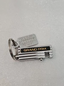 Vintage Pontiac Grand Prix Silver Black & Gold Tone Keychain - Picture 1 of 4