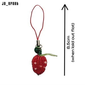 Breloque téléphone / sac en forme de fraise en perles - Photo 1/1