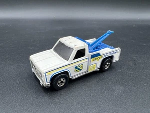 Grúa Ramblin Hot Wheels de colección paredes negras blancas colores voladores forma rota - Imagen 1 de 4