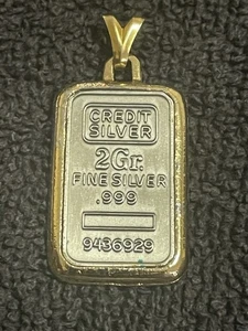 ¡Raro! Colgante vintage de plata fina Credit de 2 gramos .999 - Imagen 1 de 4