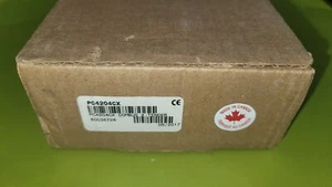 DSC PC4204CX MAXSYS Power Supply / Relay Output / Combus Repeater Module NEW - Picture 1 of 6