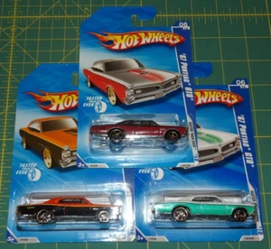 Lot of 3 - 2010 Hot Wheels Faster Than Ever - '67 Pontiac GTO - Color Variations - Picture 1 of 10