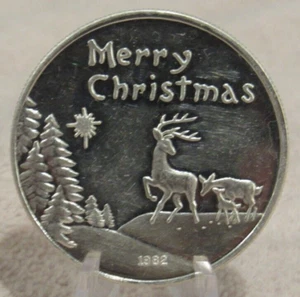 1982 Reno Feliz Navidad y Feliz Año Nuevo 1 Troy OZ Plata .999 Ronda - Imagen 1 de 2