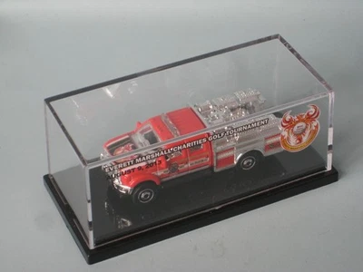 Camión de rescate de bomberos Matchbox F-550 Super Duty EM torneo de golf 2013 rojo Foto 1 de 4
