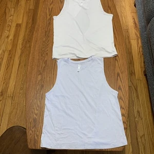 Lot of 2. Fabletics Women's Sleeveless Shirts, White Size S, Lavender Size XS - Picture 1 of 9