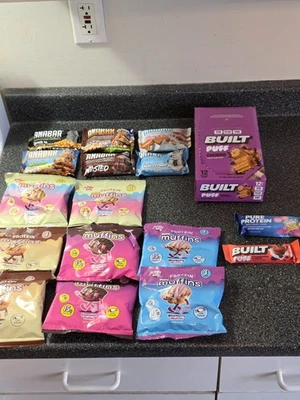 27 Assorted Flavor Protein Bars Lot: Built Puff | Prime Bites | Muffins | Anabar - Image 1 of 4