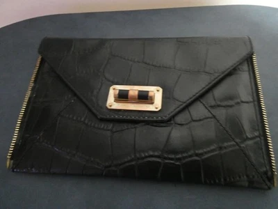 Bolso sin asas vintage de cuero negro Diane Von Furstenberg 8 ranuras para tarjetas dorado bloqueo giratorio Foto 1 de 4