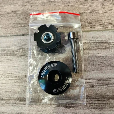 FSA 1-Inch 1-Inch Threadless Headset Top Cap Black Aluminum with Star Nut & Bolt - Image 1 of 3