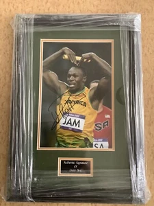 signed USAIN BOIT framed photo with certificate 51cm By 36cm - Picture 1 of 5