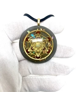 Pendentif orgonite protection CEM orgone opale et rubis Métatron Cube - Photo 1 sur 5
