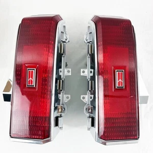 1986-88 Oldsmobile Cutlass Cutlass Supreme Tail Lights Set w/ Red Rocket Emblems - Picture 1 of 7