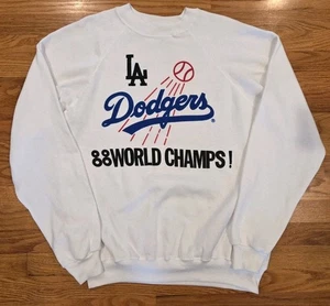 Pullover Blanco Los Angeles Dodgers 1988 Campeones Mundiales Cuello Redondo XL Hanes Años 80 LA - Imagen 1 de 24