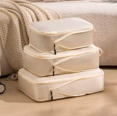 JUEGO DE 3 BOLSAS DE COMPRESIÓN DE VIAJE ROSA - BOLSA ORGANIZADORA DE EQUIPAJE IMPERMEABLE Foto 1 de 4