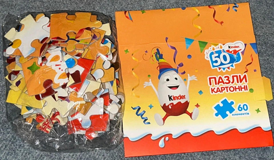 Ferrero Werbepuzzle -Kinderino Eiermann 50 Jahre Kinder Ukraine OVP mit BOX - Bild 1 von 1