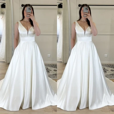 Vestidos de novia de satén blancos elegantes cuello en V sin mangas marfil línea A vestidos de novia Foto 1 de 4