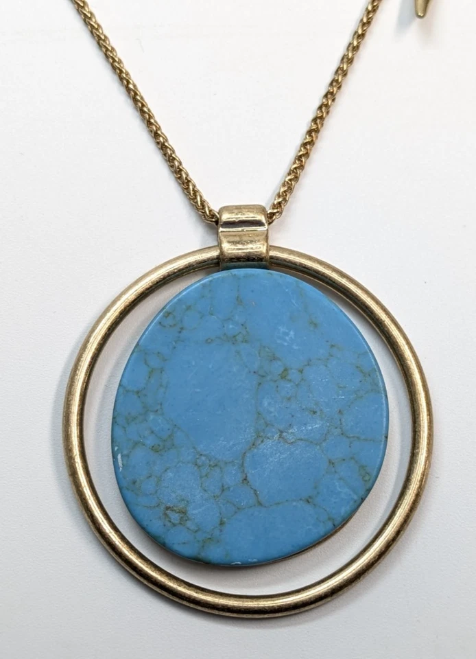 Collar orbital Robert Lee Morris Soho tono dorado imitación turquesa piedra disco 30" Foto 1 de 4