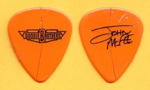 Doobie Brothers John McFee Signature Concert-Used Orange Guitar Pick - 2008 Tour - Picture 1 of 1