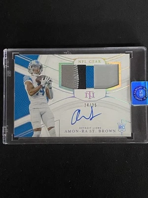 2021 Amon-Ra St. Brown National Treasures NFL Gear RPA /25 🔥 RSC-ASB - Image 1 of 3