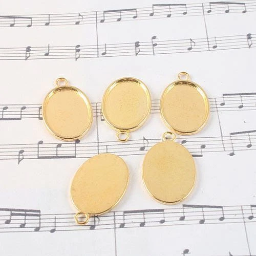 10 piezas Ajustes de cabujón ovalado tono dorado/marco de fotos en 25x18 mm G1423 Foto 1 de 1