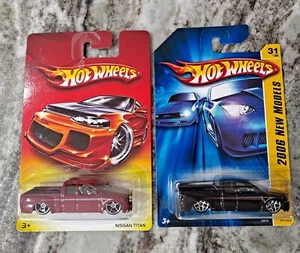 Hot Wheels 2007 Walmart Exclusive Red Card Nissan Titan & Black 2006 New Models - Picture 1 of 2
